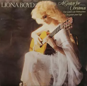 A Guitar For Christmas = Une Guitare Pour Noël = Eine Gitarre Für Weihnachten