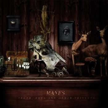 Album Manes: Teeth, Toes And Other Trinkets