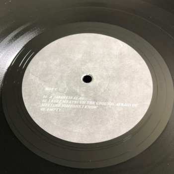 2LP Suffocate For Fuck Sake: Blazing Fires And Helicopters On The Frontpage Of The Newspaper. There's A War Going On And I'm Marching In Heavy Boots LTD
